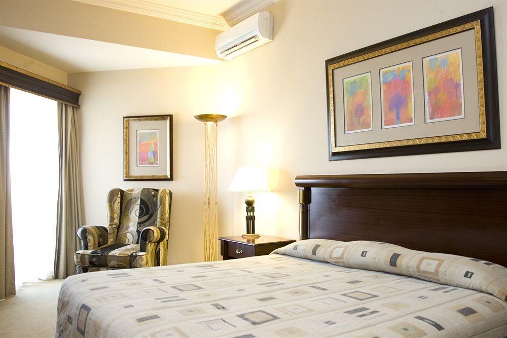 Hotel Alvalade Луанда Номер фото